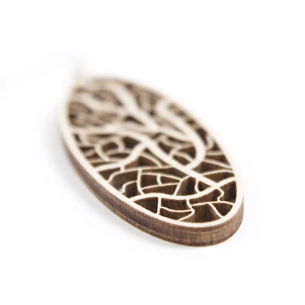 Houten oorbellen - lasergesneden oorbellen / lasercut earrings