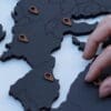 wooden world map - black detail location markers